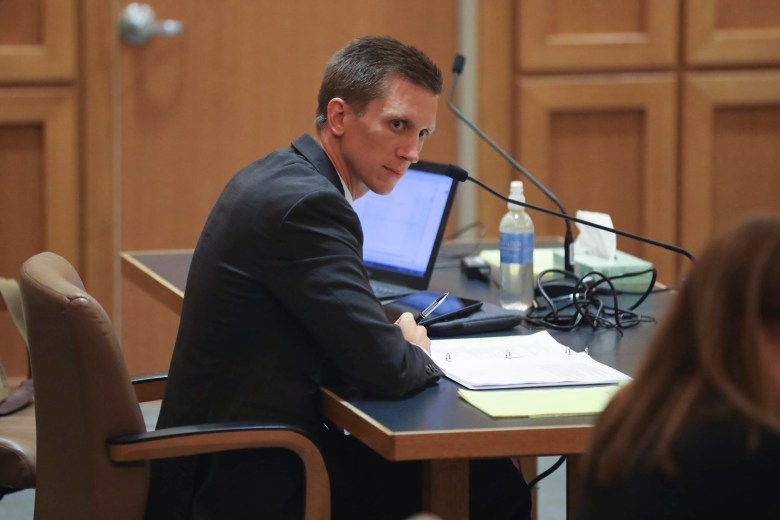 Attorney Luke Berg, deputy counsel for the conservative Wisconsin Institute for Law and Liberty, listens during a hearing at the Dane County Courthouse.